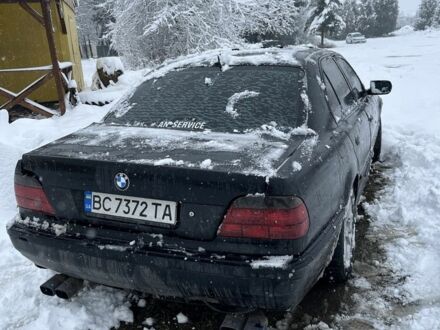 Черный БМВ 7 Серия, объемом двигателя 4.4 л и пробегом 300 тыс. км за 2900 $, фото 1 на Automoto.ua