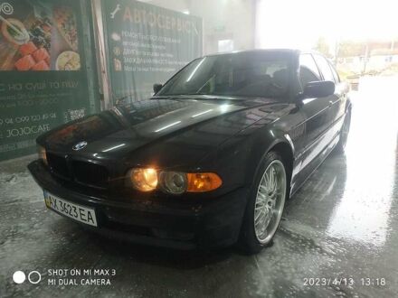 Чорний БМВ 7 Серія, об'ємом двигуна 4.4 л та пробігом 249 тис. км за 7200 $, фото 1 на Automoto.ua