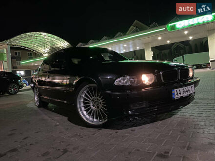 Черный БМВ 7 Серия, объемом двигателя 4.4 л и пробегом 200 тыс. км за 19000 $, фото 1 на Automoto.ua