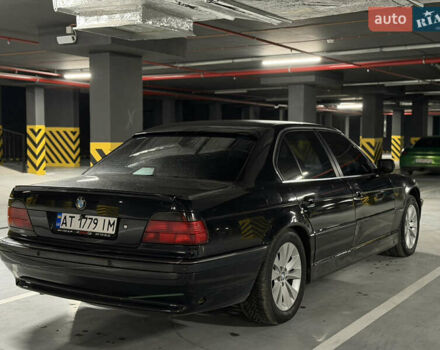 Черный БМВ 7 Серия, объемом двигателя 4.4 л и пробегом 450 тыс. км за 4500 $, фото 1 на Automoto.ua