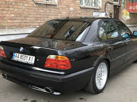 Черный БМВ 7 Серия, объемом двигателя 3.5 л и пробегом 370 тыс. км за 12000 $, фото 1 на Automoto.ua