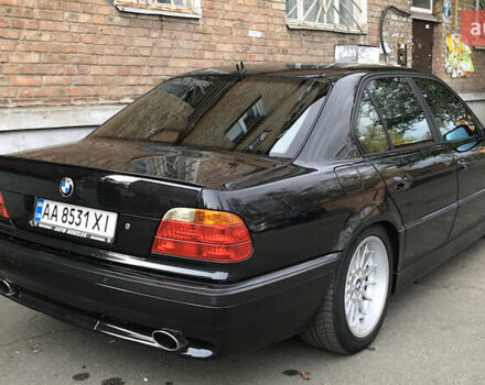 Черный БМВ 7 Серия, объемом двигателя 3.5 л и пробегом 370 тыс. км за 12000 $, фото 1 на Automoto.ua