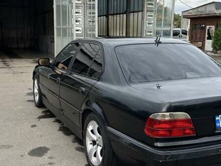 Черный БМВ 7 Серия, объемом двигателя 2.93 л и пробегом 370 тыс. км за 6500 $, фото 1 на Automoto.ua