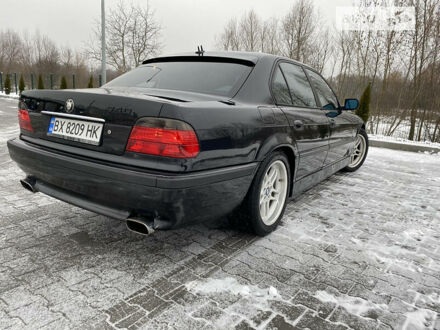 Черный БМВ 7 Серия, объемом двигателя 4.4 л и пробегом 457 тыс. км за 7000 $, фото 1 на Automoto.ua