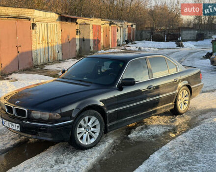 Черный БМВ 7 Серия, объемом двигателя 4.4 л и пробегом 200 тыс. км за 3900 $, фото 1 на Automoto.ua