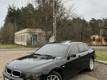 Черный БМВ 7 Серия, объемом двигателя 4.4 л и пробегом 358 тыс. км за 4599 $, фото 1 на Automoto.ua