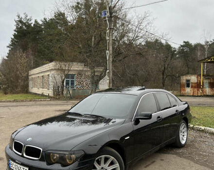 Черный БМВ 7 Серия, объемом двигателя 4.4 л и пробегом 358 тыс. км за 4599 $, фото 1 на Automoto.ua