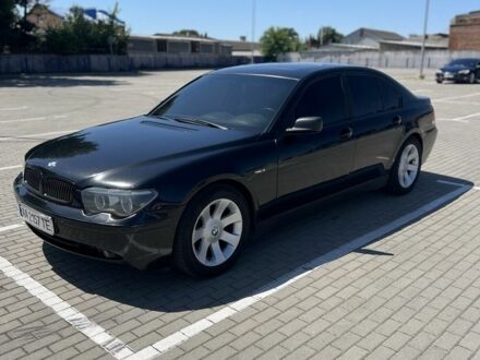 Черный БМВ 7 Серия, объемом двигателя 4.4 л и пробегом 300 тыс. км за 4300 $, фото 1 на Automoto.ua