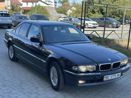 Черный БМВ 7 Серия, объемом двигателя 3 л и пробегом 380 тыс. км за 4600 $, фото 1 на Automoto.ua