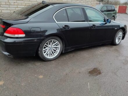 Черный БМВ 7 Серия, объемом двигателя 4.4 л и пробегом 200 тыс. км за 3500 $, фото 1 на Automoto.ua