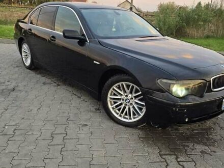 Чорний БМВ 7 Серія, об'ємом двигуна 4.4 л та пробігом 300 тис. км за 2999 $, фото 1 на Automoto.ua