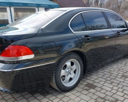 Черный БМВ 7 Серия, объемом двигателя 4.4 л и пробегом 285 тыс. км за 4500 $, фото 1 на Automoto.ua