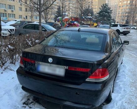 Черный БМВ 7 Серия, объемом двигателя 4.4 л и пробегом 360 тыс. км за 3500 $, фото 1 на Automoto.ua
