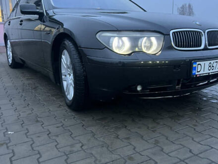 Черный БМВ 7 Серия, объемом двигателя 3.6 л и пробегом 380 тыс. км за 7000 $, фото 1 на Automoto.ua