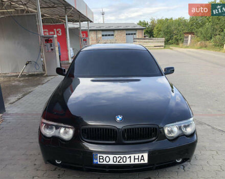 Черный БМВ 7 Серия, объемом двигателя 4.4 л и пробегом 465 тыс. км за 4450 $, фото 1 на Automoto.ua