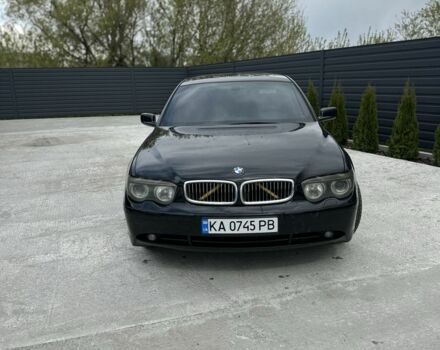 Черный БМВ 7 Серия, объемом двигателя 4.4 л и пробегом 280 тыс. км за 5800 $, фото 1 на Automoto.ua