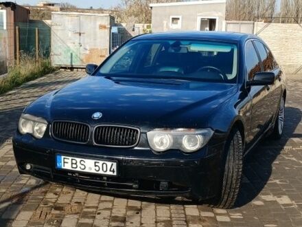 Черный БМВ 7 Серия, объемом двигателя 3 л и пробегом 300 тыс. км за 3200 $, фото 1 на Automoto.ua
