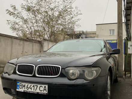 Черный БМВ 7 Серия, объемом двигателя 4.4 л и пробегом 400 тыс. км за 3600 $, фото 1 на Automoto.ua