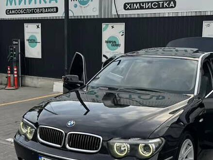 Черный БМВ 7 Серия, объемом двигателя 4.4 л и пробегом 380 тыс. км за 6200 $, фото 1 на Automoto.ua