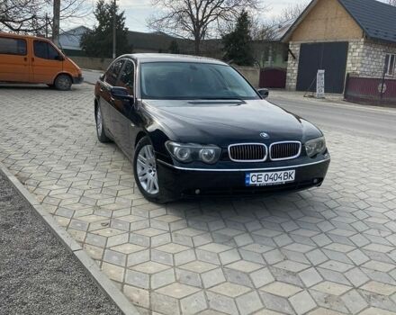 Черный БМВ 7 Серия, объемом двигателя 4.4 л и пробегом 312 тыс. км за 4900 $, фото 1 на Automoto.ua
