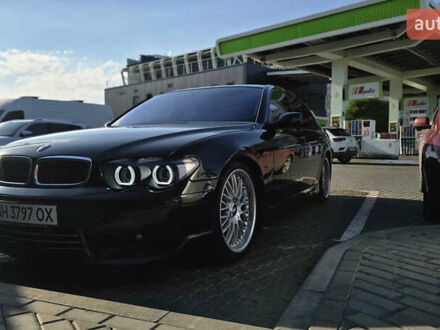 Черный БМВ 7 Серия, объемом двигателя 4.4 л и пробегом 210 тыс. км за 8500 $, фото 1 на Automoto.ua