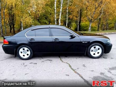 Черный БМВ 7 Серия, объемом двигателя 3.5 л и пробегом 441 тыс. км за 6200 $, фото 1 на Automoto.ua