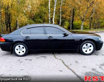 Чорний БМВ 7 Серія, об'ємом двигуна 3.5 л та пробігом 441 тис. км за 6200 $, фото 1 на Automoto.ua