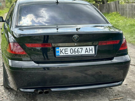 Черный БМВ 7 Серия, объемом двигателя 4.4 л и пробегом 300 тыс. км за 6500 $, фото 1 на Automoto.ua