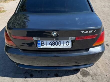 Черный БМВ 7 Серия, объемом двигателя 4.4 л и пробегом 462 тыс. км за 3900 $, фото 1 на Automoto.ua