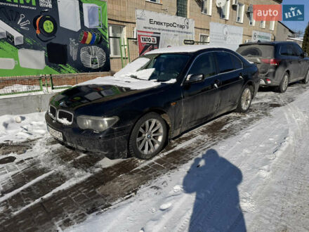 Черный БМВ 7 Серия, объемом двигателя 4.4 л и пробегом 350 тыс. км за 2400 $, фото 1 на Automoto.ua