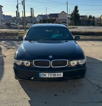 Черный БМВ 7 Серия, объемом двигателя 3 л и пробегом 267 тыс. км за 5000 $, фото 1 на Automoto.ua