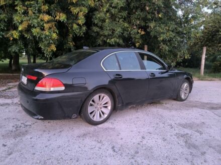 Черный БМВ 7 Серия, объемом двигателя 4 л и пробегом 420 тыс. км за 4500 $, фото 1 на Automoto.ua