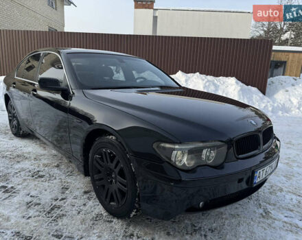 Черный БМВ 7 Серия, объемом двигателя 3 л и пробегом 444 тыс. км за 6299 $, фото 1 на Automoto.ua