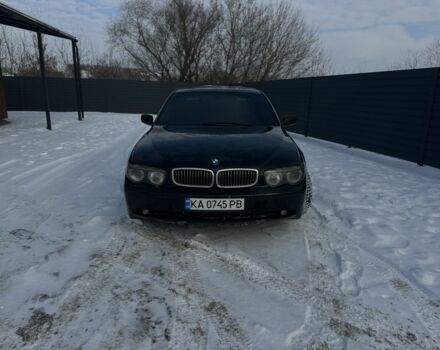 Черный БМВ 7 Серия, объемом двигателя 4.4 л и пробегом 200 тыс. км за 5300 $, фото 1 на Automoto.ua