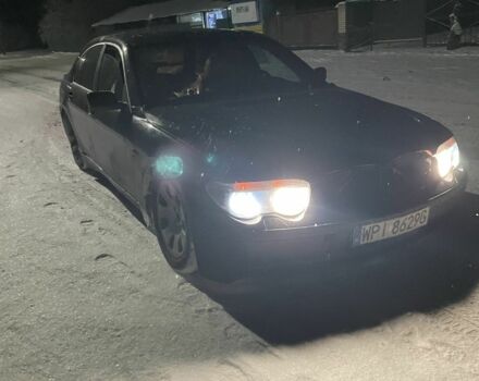 Черный БМВ 7 Серия, объемом двигателя 4 л и пробегом 389 тыс. км за 1800 $, фото 1 на Automoto.ua