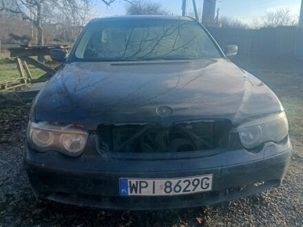 Чорний БМВ 7 Серія, об'ємом двигуна 4 л та пробігом 388 тис. км за 2000 $, фото 1 на Automoto.ua