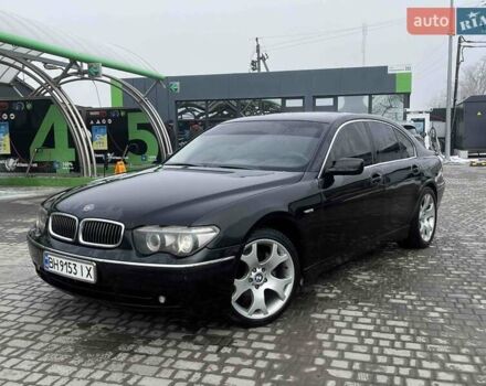 Черный БМВ 7 Серия, объемом двигателя 4.4 л и пробегом 234 тыс. км за 7300 $, фото 1 на Automoto.ua