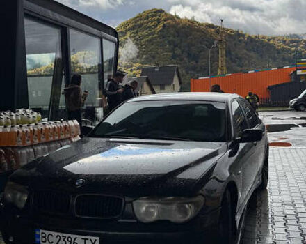 Черный БМВ 7 Серия, объемом двигателя 4.4 л и пробегом 325 тыс. км за 6700 $, фото 1 на Automoto.ua