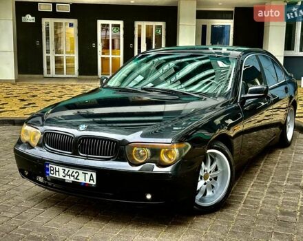 Черный БМВ 7 Серия, объемом двигателя 4.4 л и пробегом 277 тыс. км за 5600 $, фото 1 на Automoto.ua