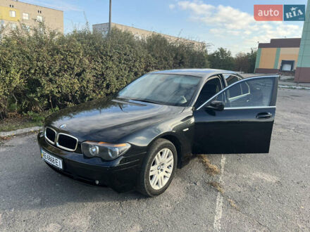 Черный БМВ 7 Серия, объемом двигателя 4.4 л и пробегом 350 тыс. км за 7500 $, фото 1 на Automoto.ua