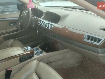 Черный БМВ 7 Серия, объемом двигателя 2.98 л и пробегом 326 тыс. км за 6500 $, фото 1 на Automoto.ua