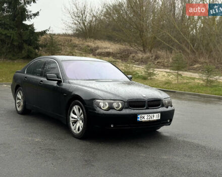 Черный БМВ 7 Серия, объемом двигателя 4 л и пробегом 280 тыс. км за 6500 $, фото 1 на Automoto.ua