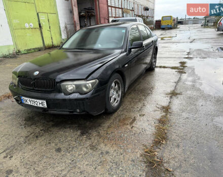Черный БМВ 7 Серия, объемом двигателя 3.6 л и пробегом 242 тыс. км за 2999 $, фото 1 на Automoto.ua