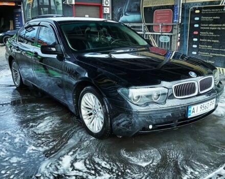 Черный БМВ 7 Серия, объемом двигателя 4.4 л и пробегом 320 тыс. км за 8500 $, фото 1 на Automoto.ua