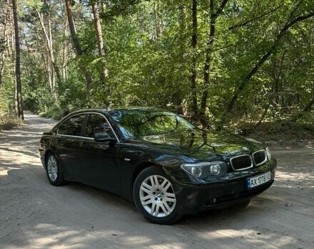 Черный БМВ 7 Серия, объемом двигателя 3 л и пробегом 305 тыс. км за 6000 $, фото 1 на Automoto.ua
