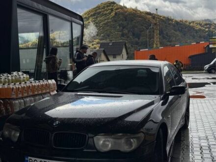 Черный БМВ 7 Серия, объемом двигателя 4.4 л и пробегом 326 тыс. км за 7000 $, фото 1 на Automoto.ua