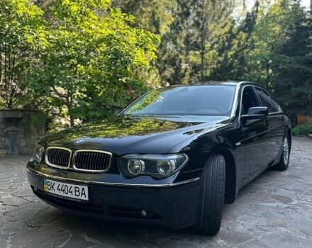 Черный БМВ 7 Серия, объемом двигателя 4.4 л и пробегом 37 тыс. км за 20000 $, фото 1 на Automoto.ua