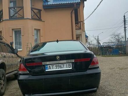Черный БМВ 7 Серия, объемом двигателя 2.99 л и пробегом 412 тыс. км за 7500 $, фото 1 на Automoto.ua
