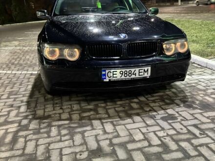Черный БМВ 7 Серия, объемом двигателя 4.4 л и пробегом 400 тыс. км за 6500 $, фото 1 на Automoto.ua