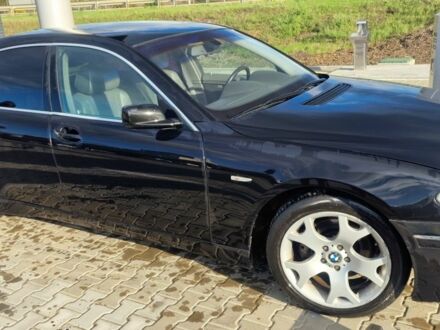 Черный БМВ 7 Серия, объемом двигателя 4.4 л и пробегом 231 тыс. км за 5200 $, фото 1 на Automoto.ua